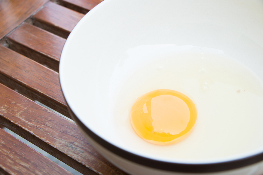 raw egg in plate