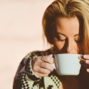 woman drinking from mug