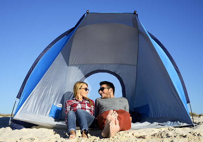 couple beach camping
