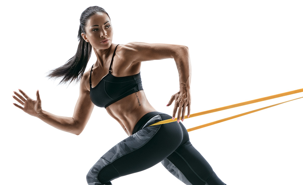 woman muscle resistance band