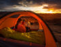 woman camping sunset