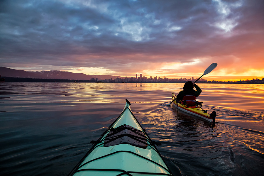 Kayakers near Kitsilano Beach, Vancouver, BC, Canada.